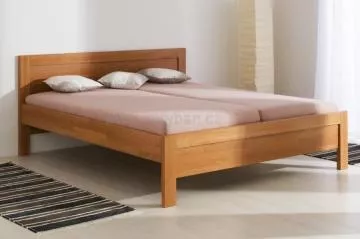 Dřevěná postel z masivu Karlo masiv oblé