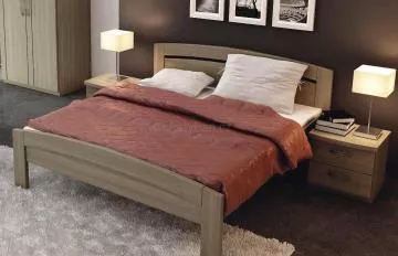 Dřevěná postel z masivu Michaela plus s oblým čelem